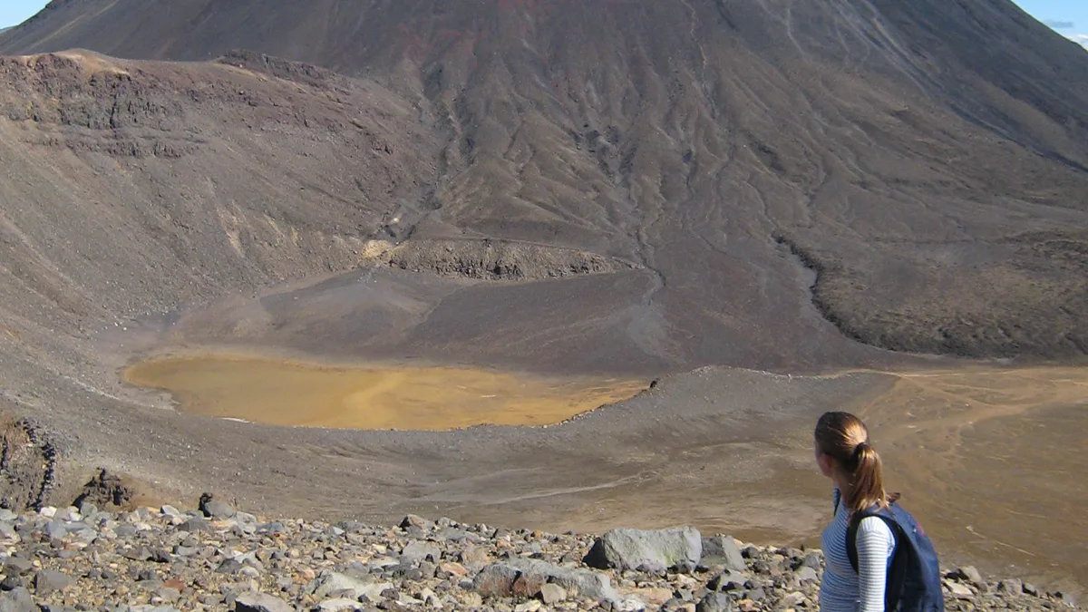 Volcanic cone of Mount Ngauruhoe standing across alpine scrub